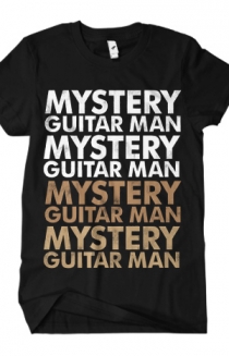 Mystery Guitar Man (Brown on Black)